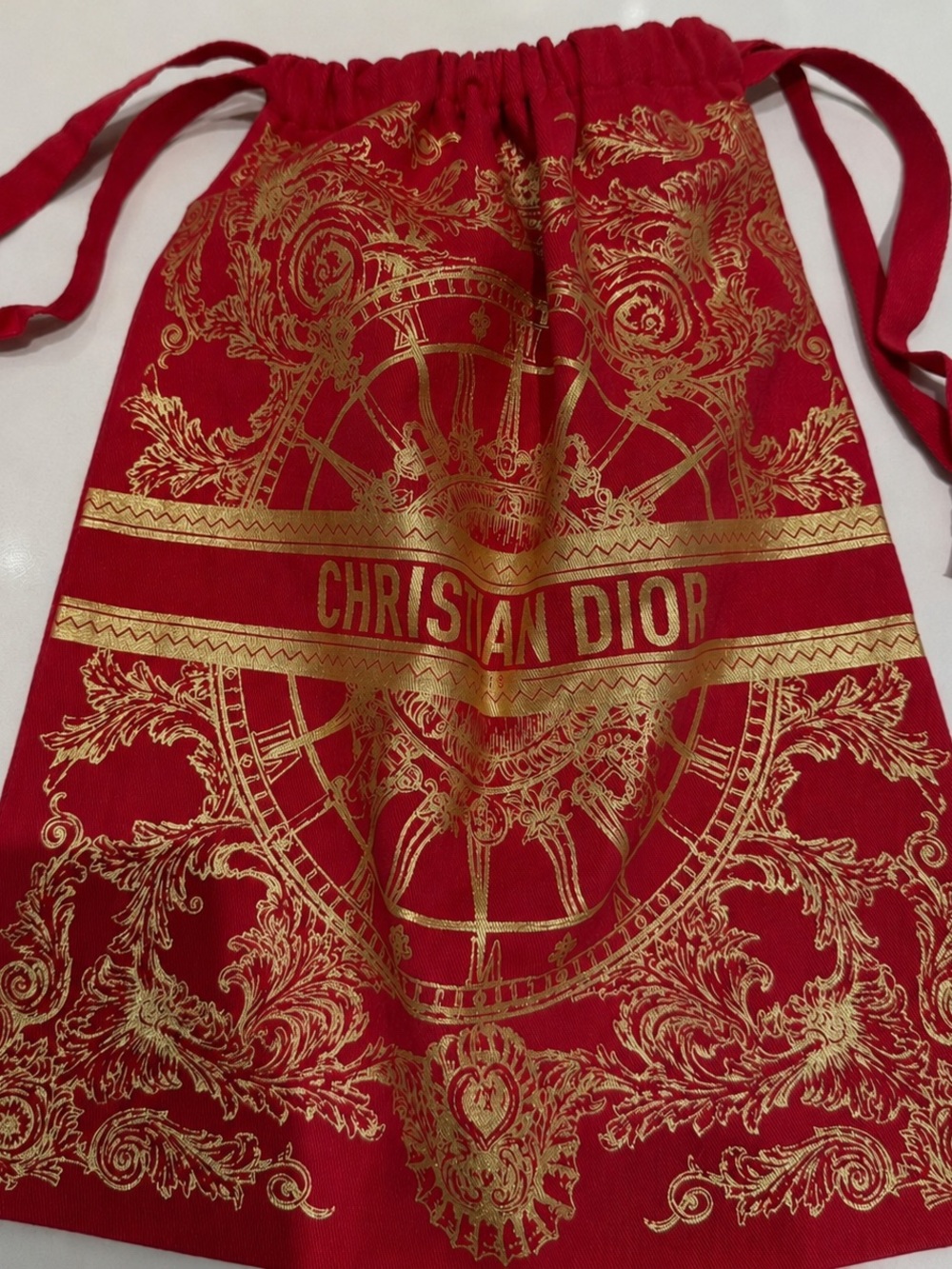 Dior Red and Gold Drawstring Bag